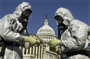 2 people in hazmat suits